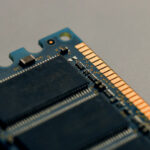 An image capturing a portion of an SDRAM module for the article "DDR5 SDRAM: Advantages and Disadvantages"