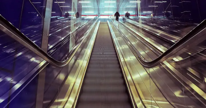 An image of an escalator for the article "Bottom-Up Management: Advantages and Disadvantages"