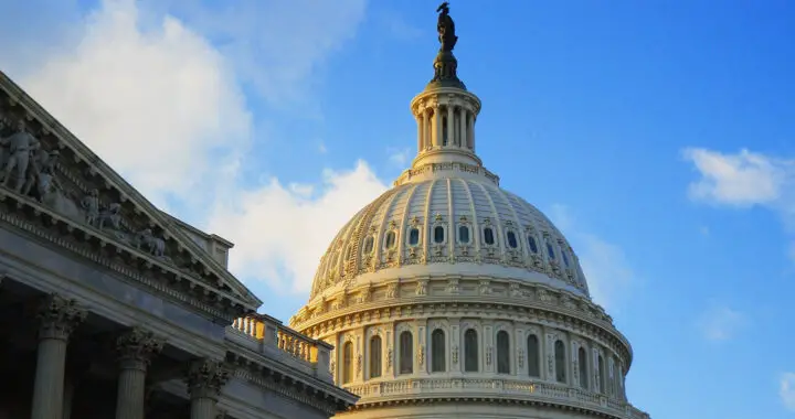 A close-up shot of the exterior dome of the U.S. Capitol for the article "Why Does Donald Trump Want To Remove The Debt Ceiling?"