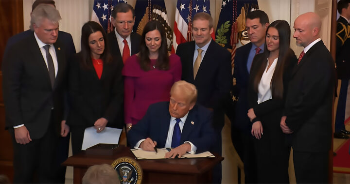 An image of Donald Trump signing the Laken Riley Act for the article "In Brief: Explaining the Laken Riley Act"